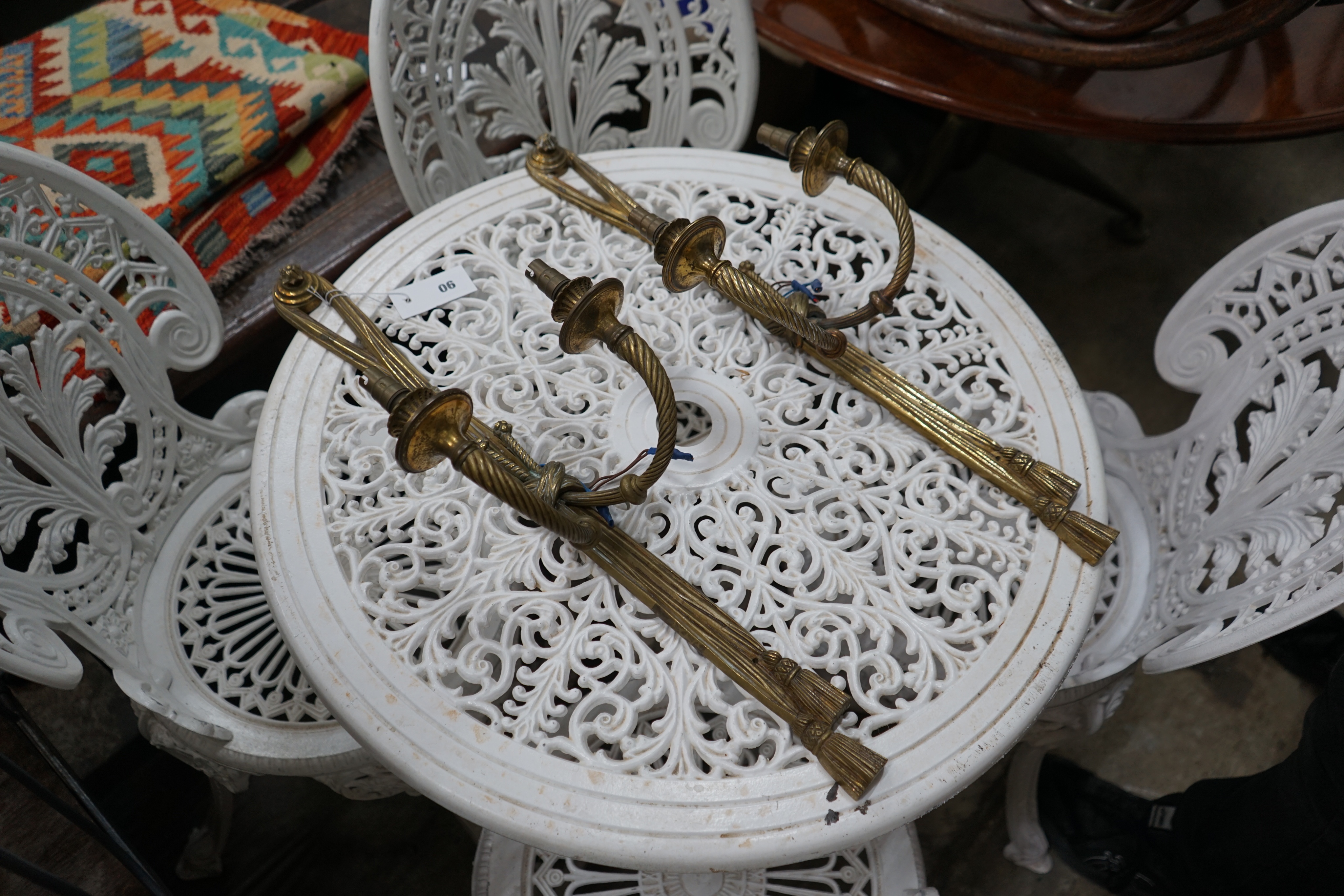 A pair of gilt metal two branch wall lights, height 64cm